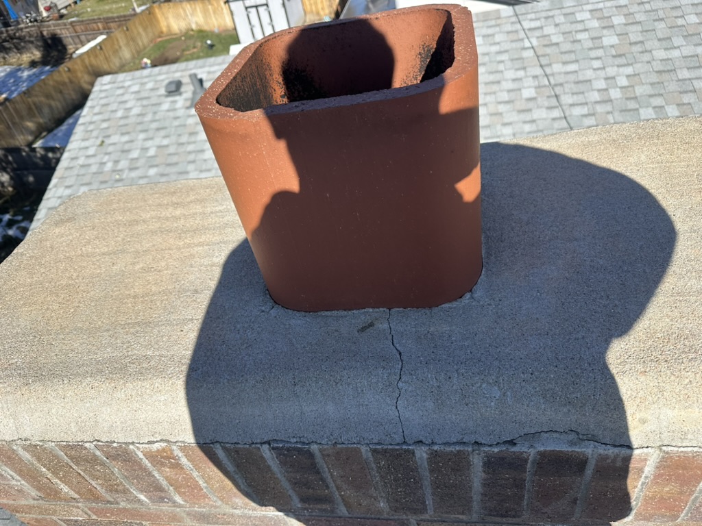 Chimney top and flue inspection during fireplace service